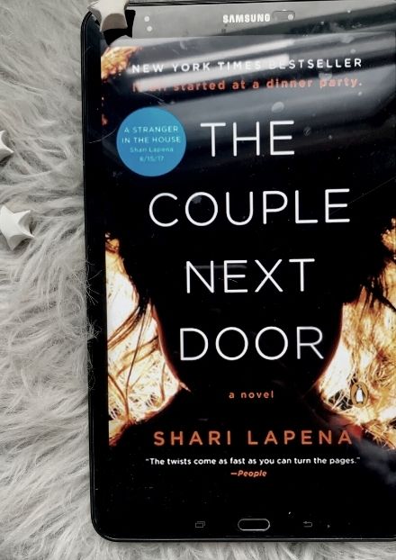The couple next door by Shari Lapena