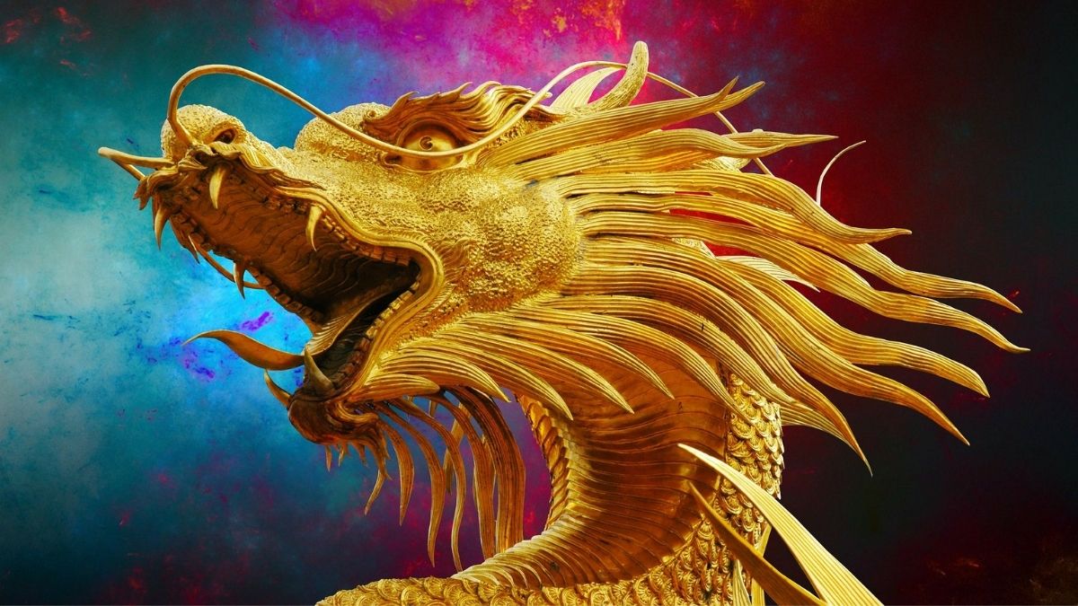 A golden dragons head on colourful background