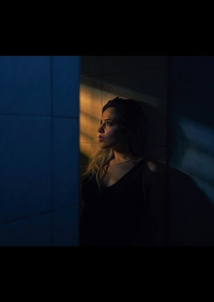 Woman in shadows
